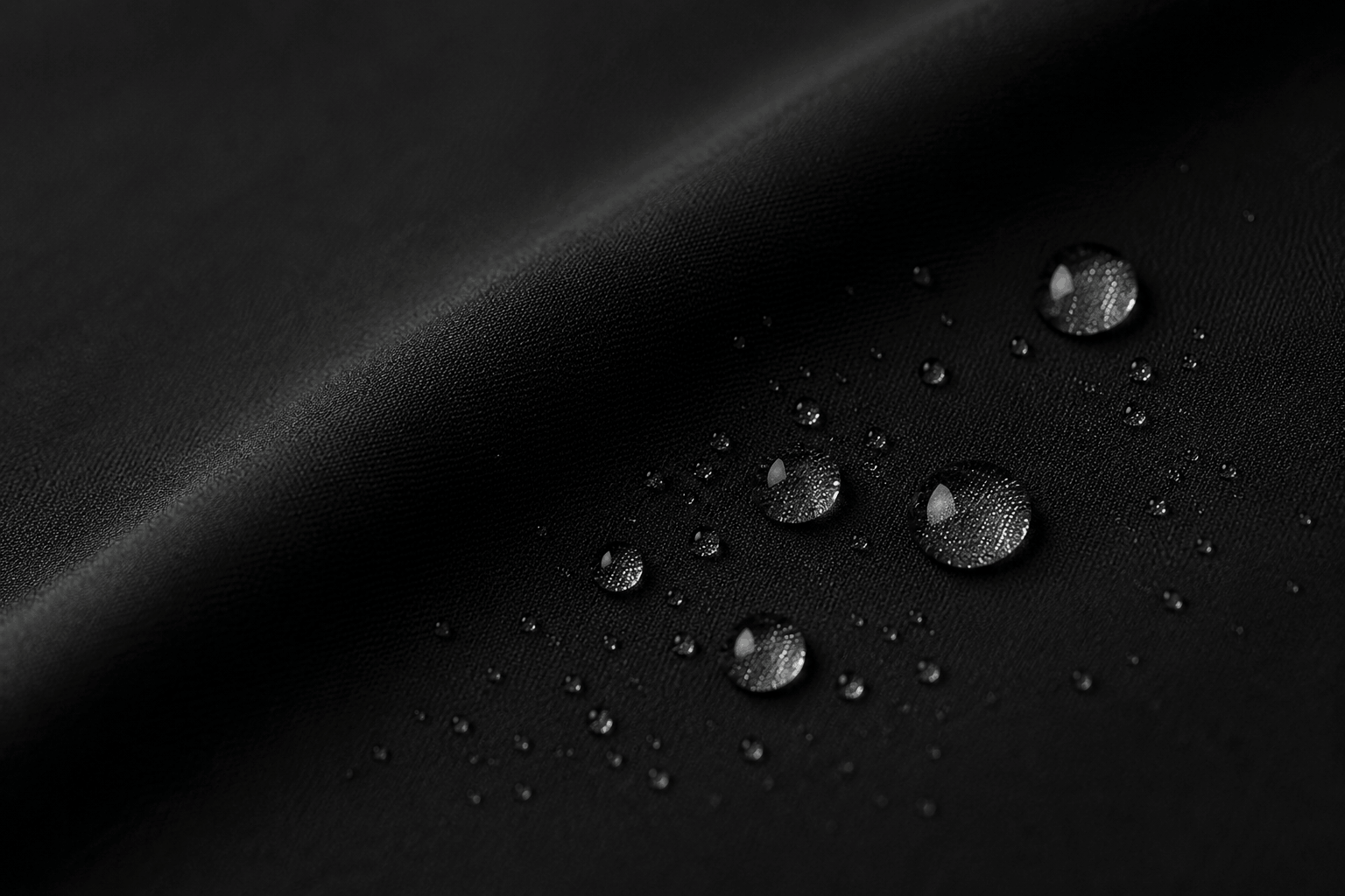 Water beading on spill-resistant fabric